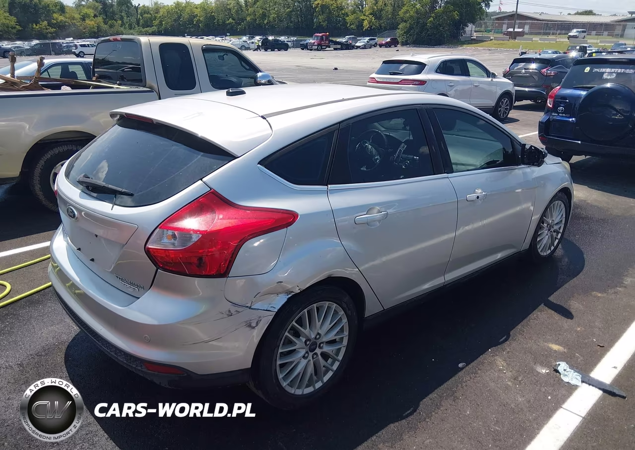 2014 Ford Focus Titanium VIN:1FADP3N23EL298080 - 6