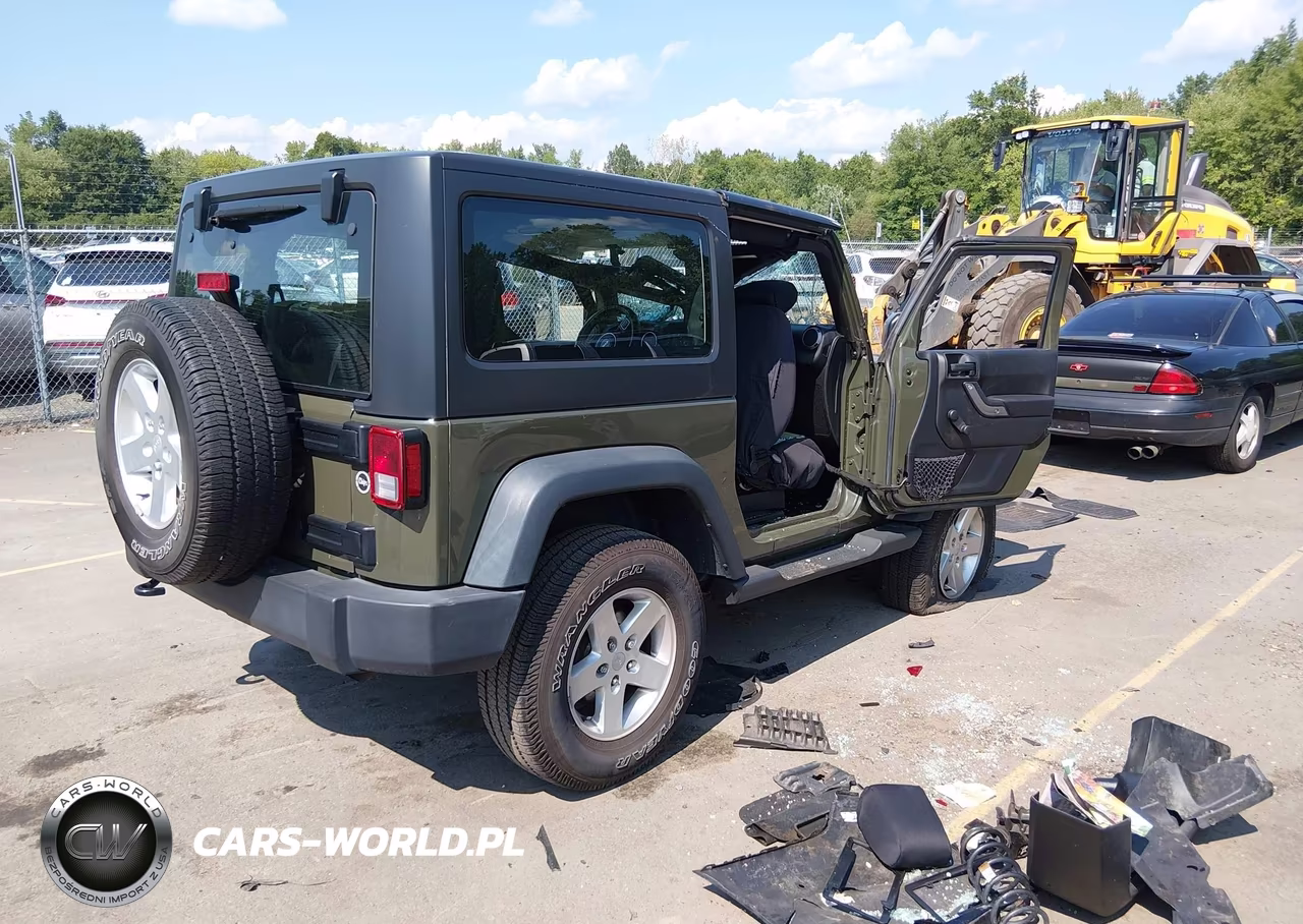 2015 Jeep Wrangler Sport VIN:1C4GJWAG3FL564100 - 4