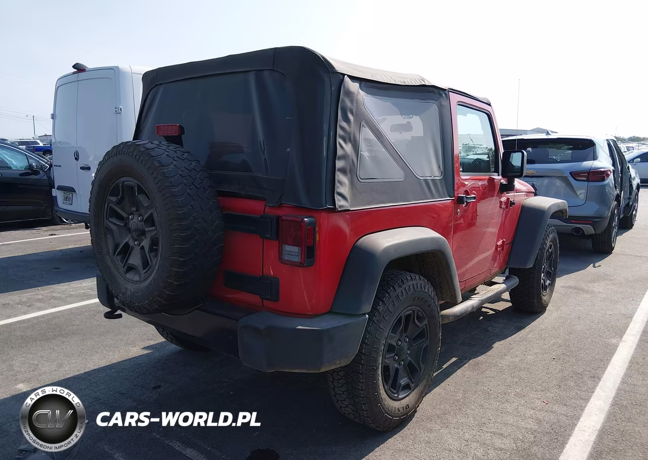 2015 Jeep Wrangler Willys Wheeler VIN:1C4AJWAG5FL596844 - 4