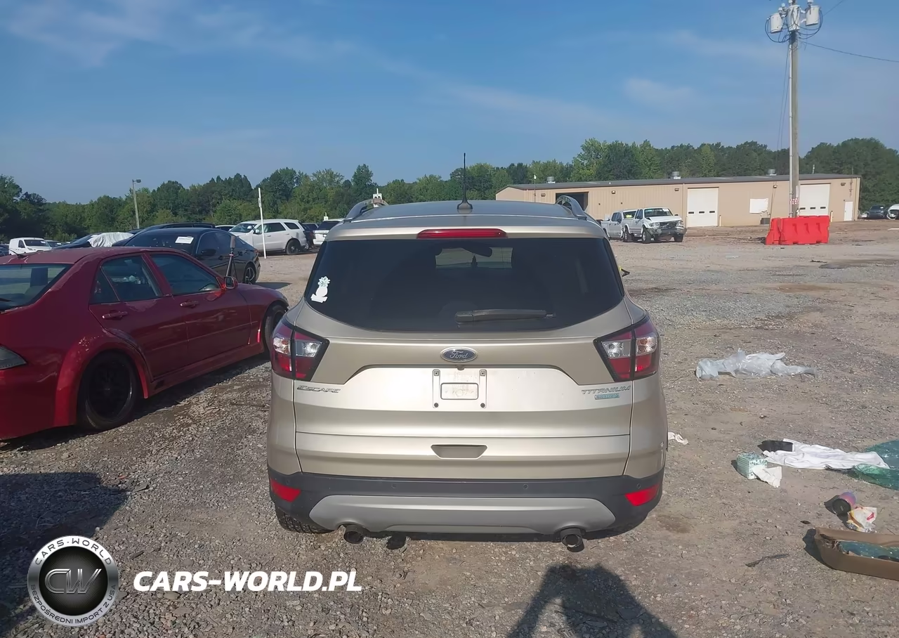 2018 Ford Escape Titanium VIN:1FMCU0J90JUD25994 - 16