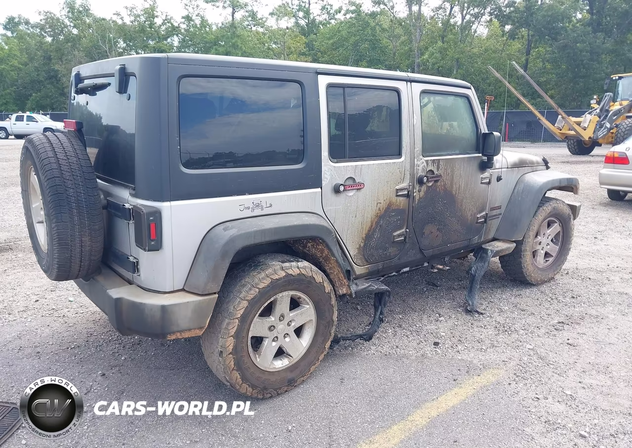 2012 Jeep Wrangler Unlimited Sport VIN:1C4HJWDG6CL124626 - 4