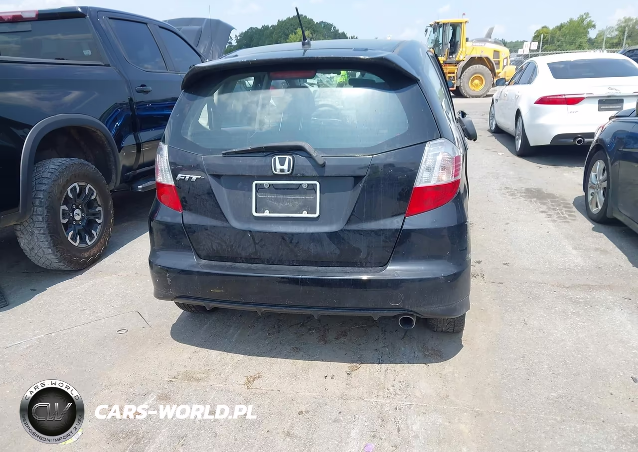 2013 Honda Fit Sport VIN:JHMGE8H54DC060591 - 16