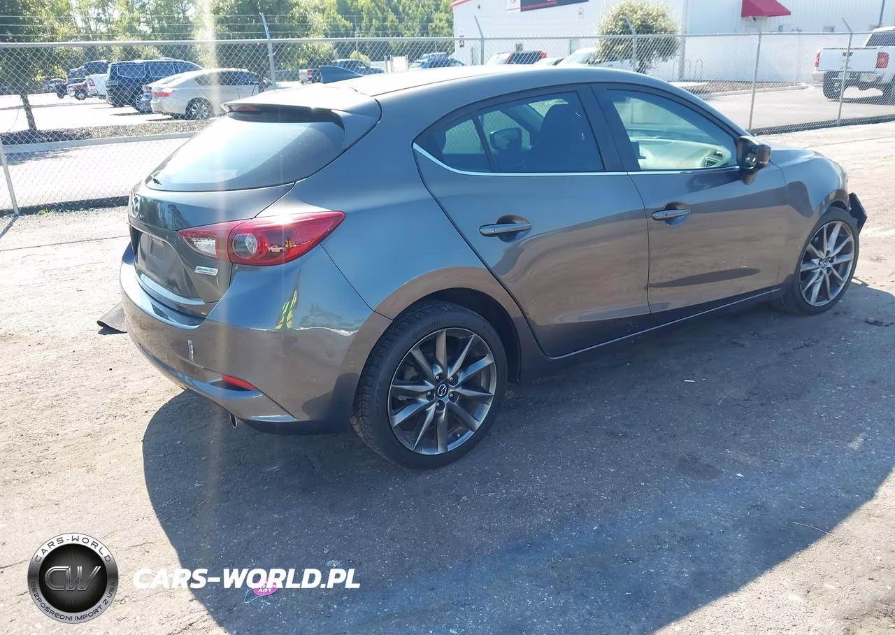 2018 Mazda Mazda3 Grand Touring VIN:3MZBN1M39JM204859 - 4
