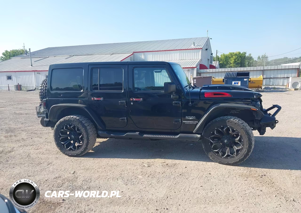 2011 Jeep Wrangler Unlimited Sahara VIN:1J4BA5H15BL557093 - 13