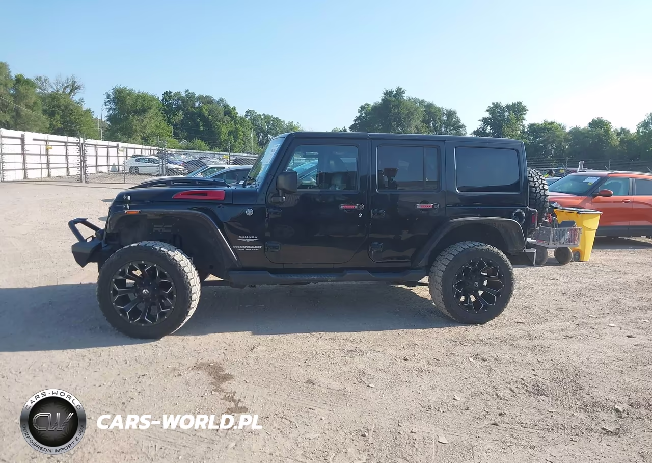 2011 Jeep Wrangler Unlimited Sahara VIN:1J4BA5H15BL557093 - 14