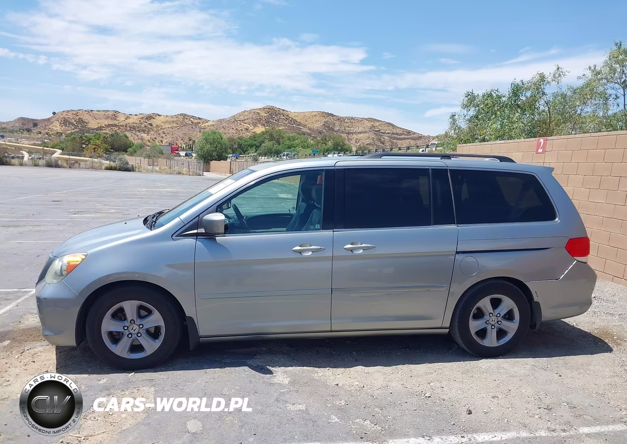 2010 Honda Odyssey Touring VIN:5FNRL3H9XAB096953 - 14