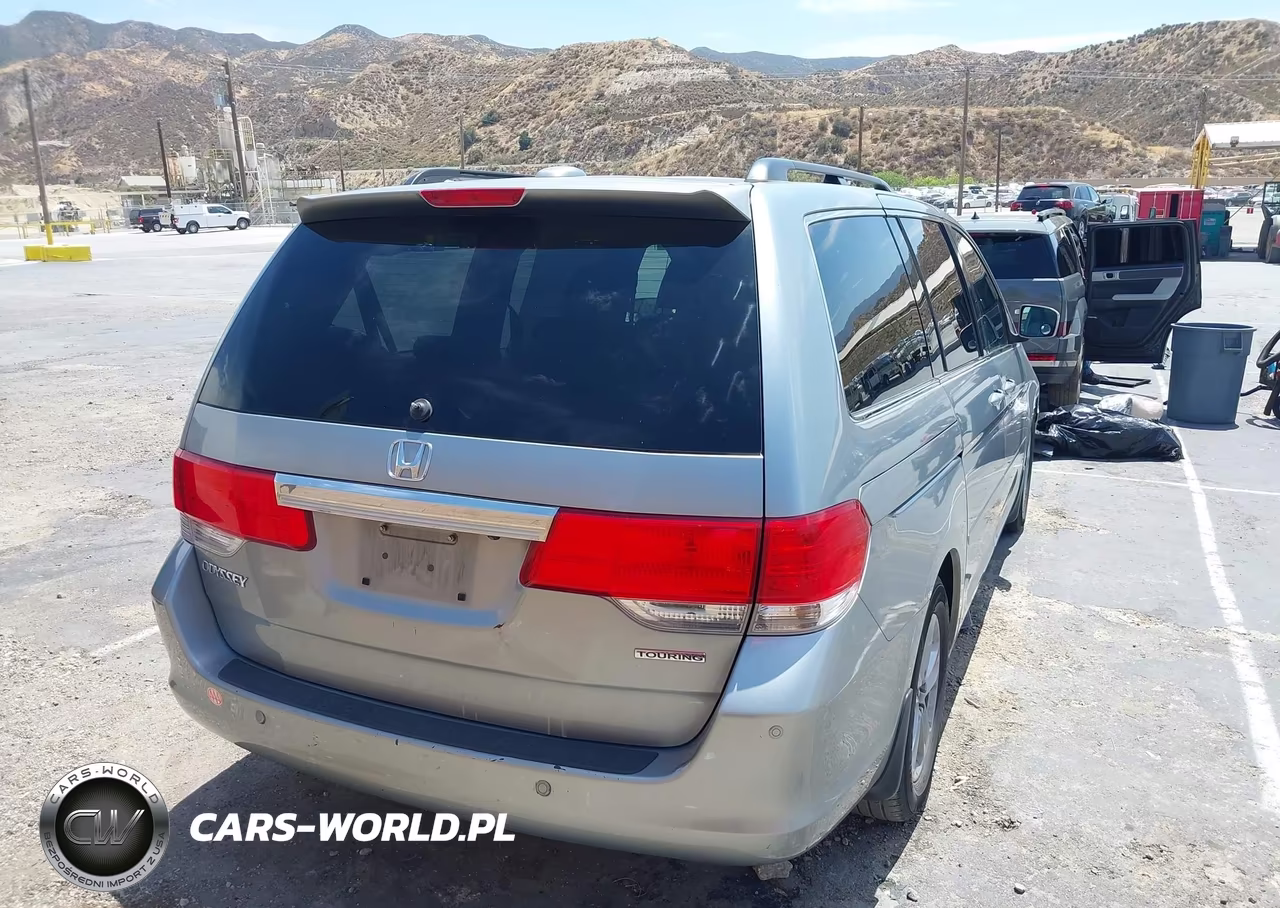 2010 Honda Odyssey Touring VIN:5FNRL3H9XAB096953 - 4