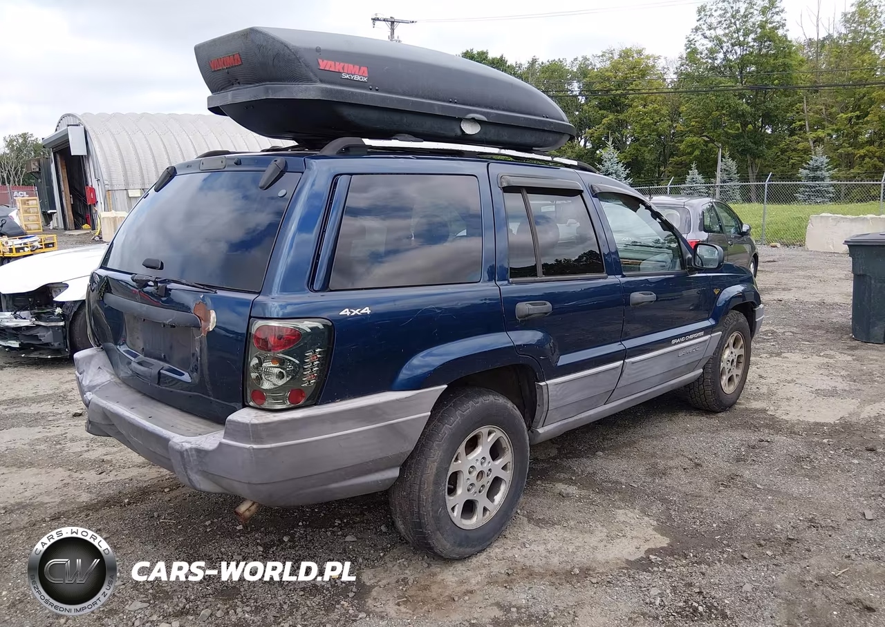 1999 Jeep Grand Cherokee Laredo VIN:1J4GW58S8XC733836 - 4