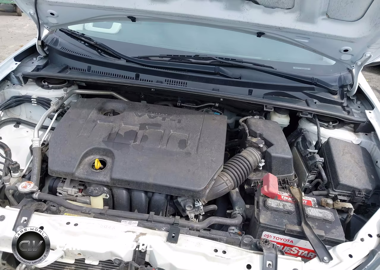 2018 Toyota Corolla L VIN:5YFBURHE3JP850410 - 10