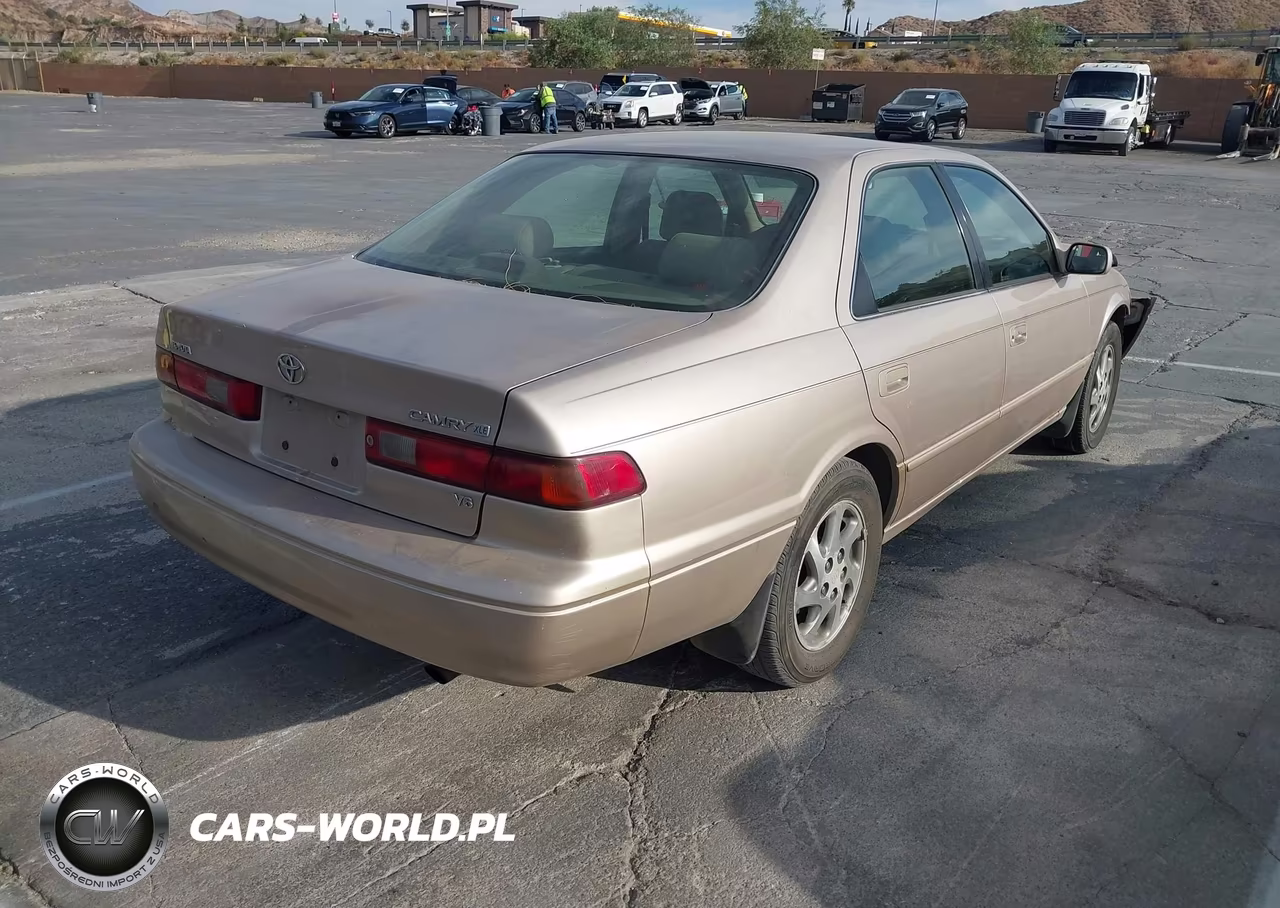 1999 Toyota Camry Xle V6 VIN:4T1BF28K9XU080986 - 4