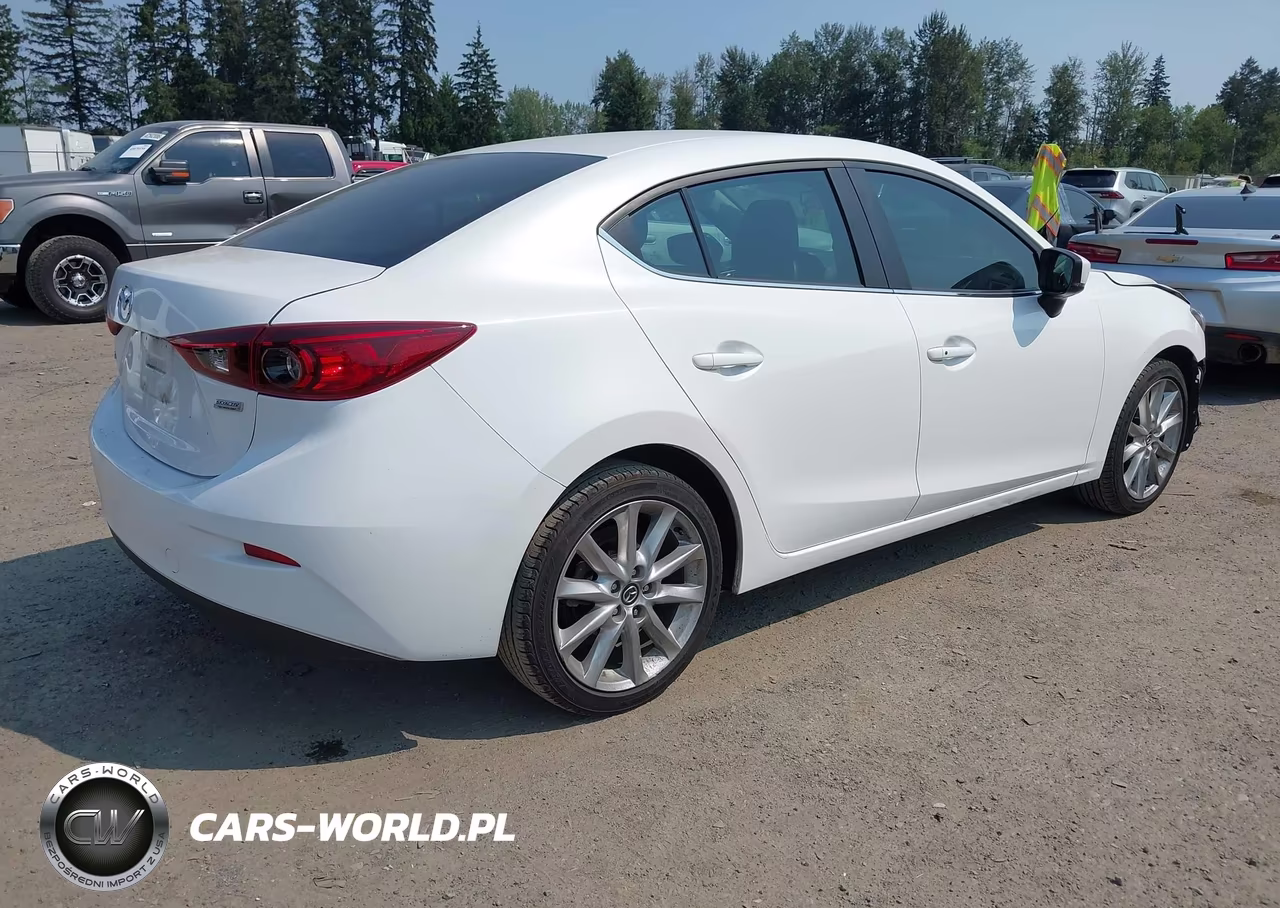 2017 Mazda Mazda3 Touring VIN:3MZBN1V77HM126495 - 4