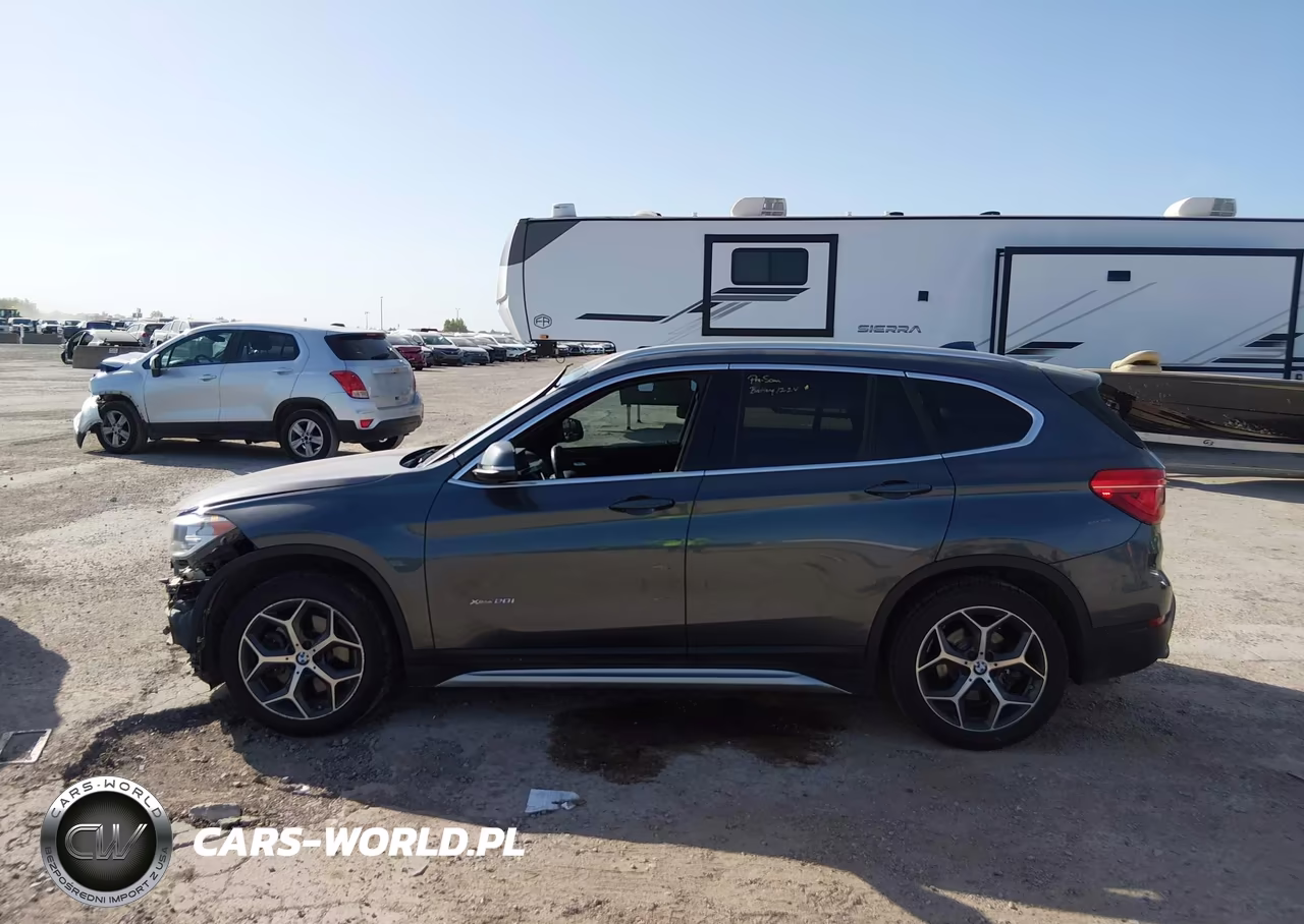 2018 BMW X1 xDrive28I VIN:WBXHT3C37J5K26562 - 14