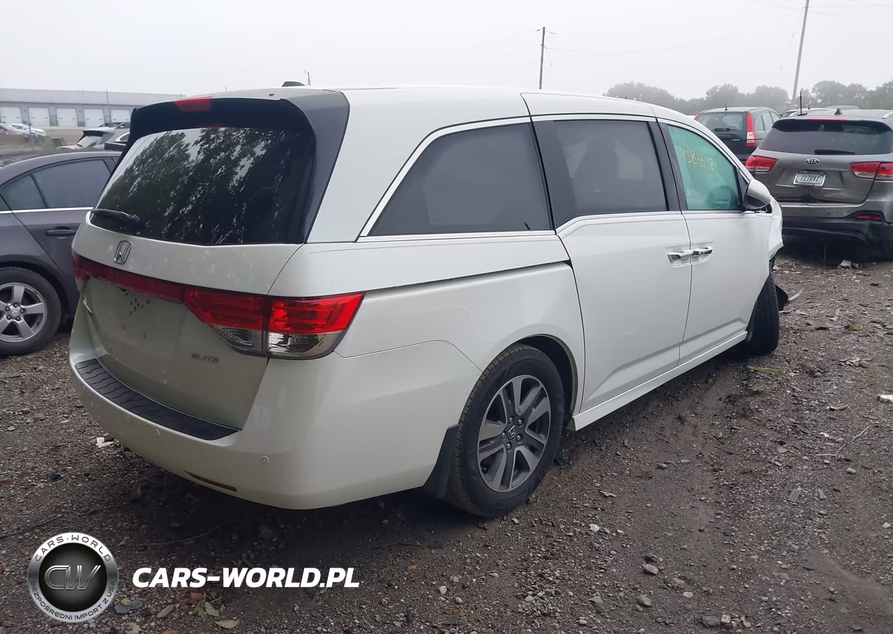 2015 Honda Odyssey Touring-Touring Elite VIN:5FNRL5H94FB001600 - 4