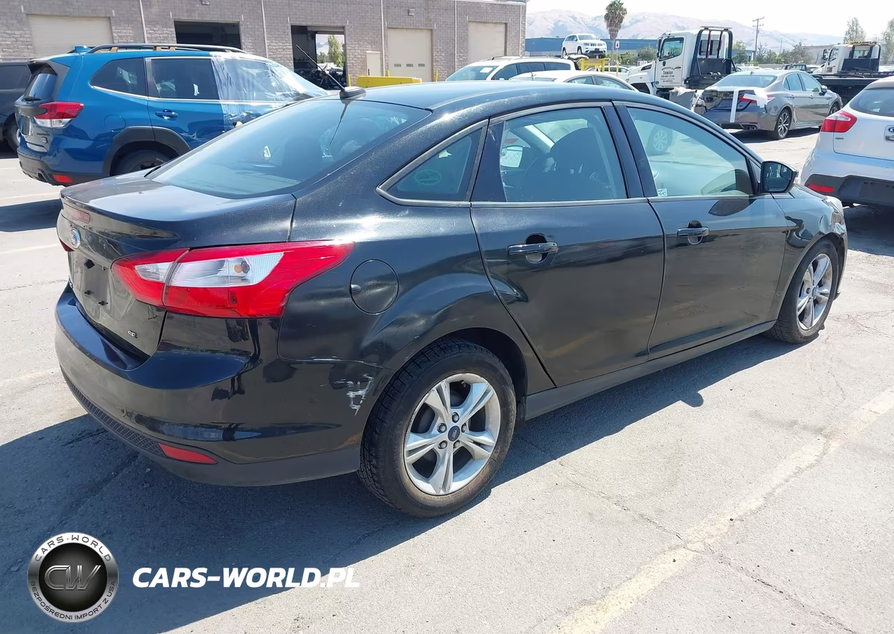 2014 Ford Focus Se VIN:1FADP3F23EL408009 - 4