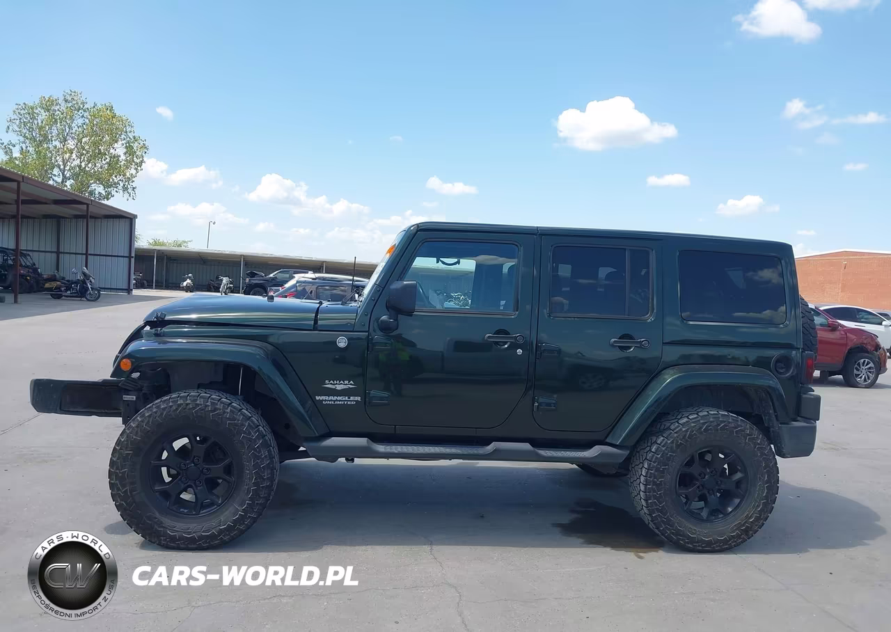 2011 Jeep Wrangler Unlimited Sahara VIN:1J4BA5H16BL595688 - 14