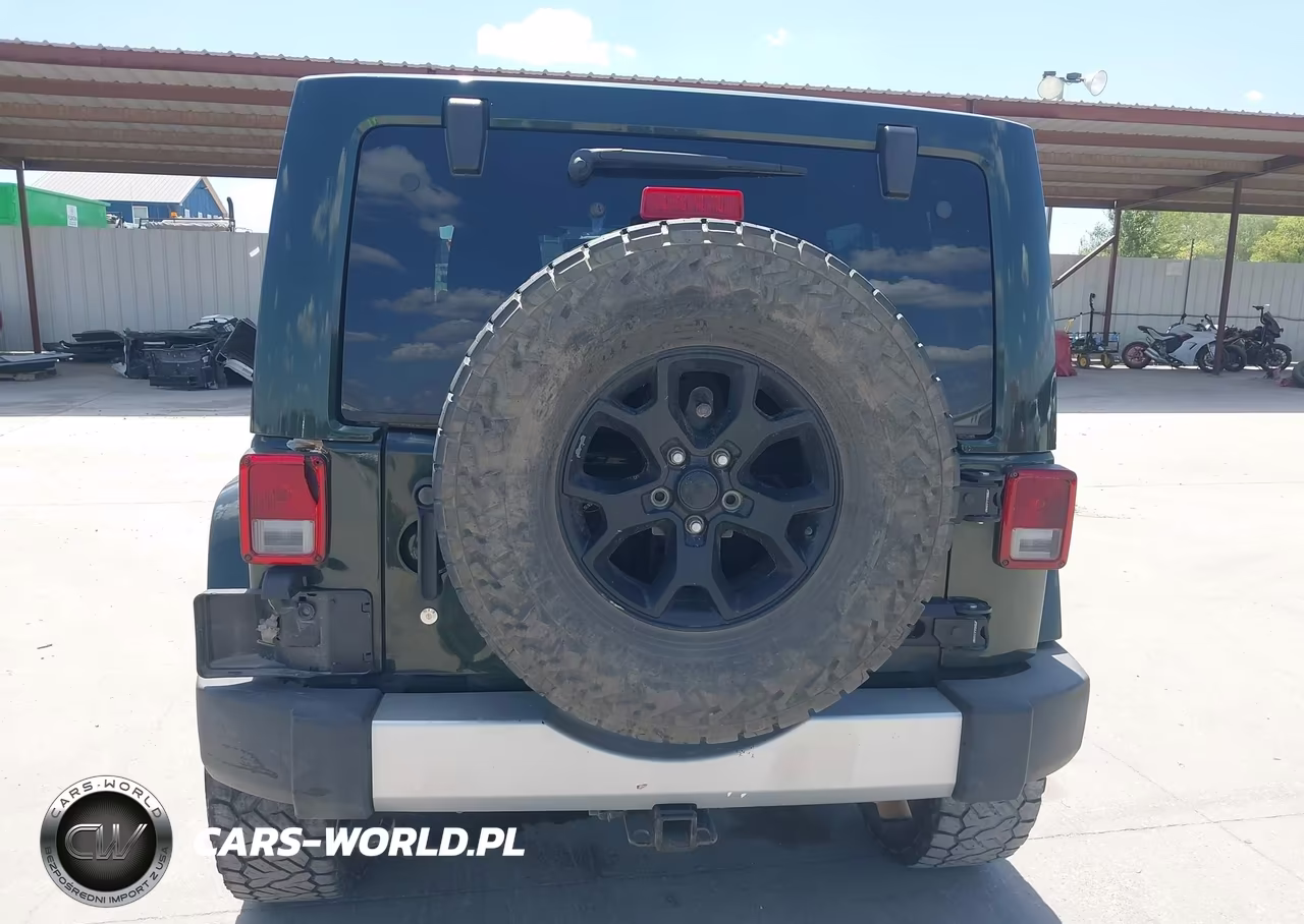 2011 Jeep Wrangler Unlimited Sahara VIN:1J4BA5H16BL595688 - 16