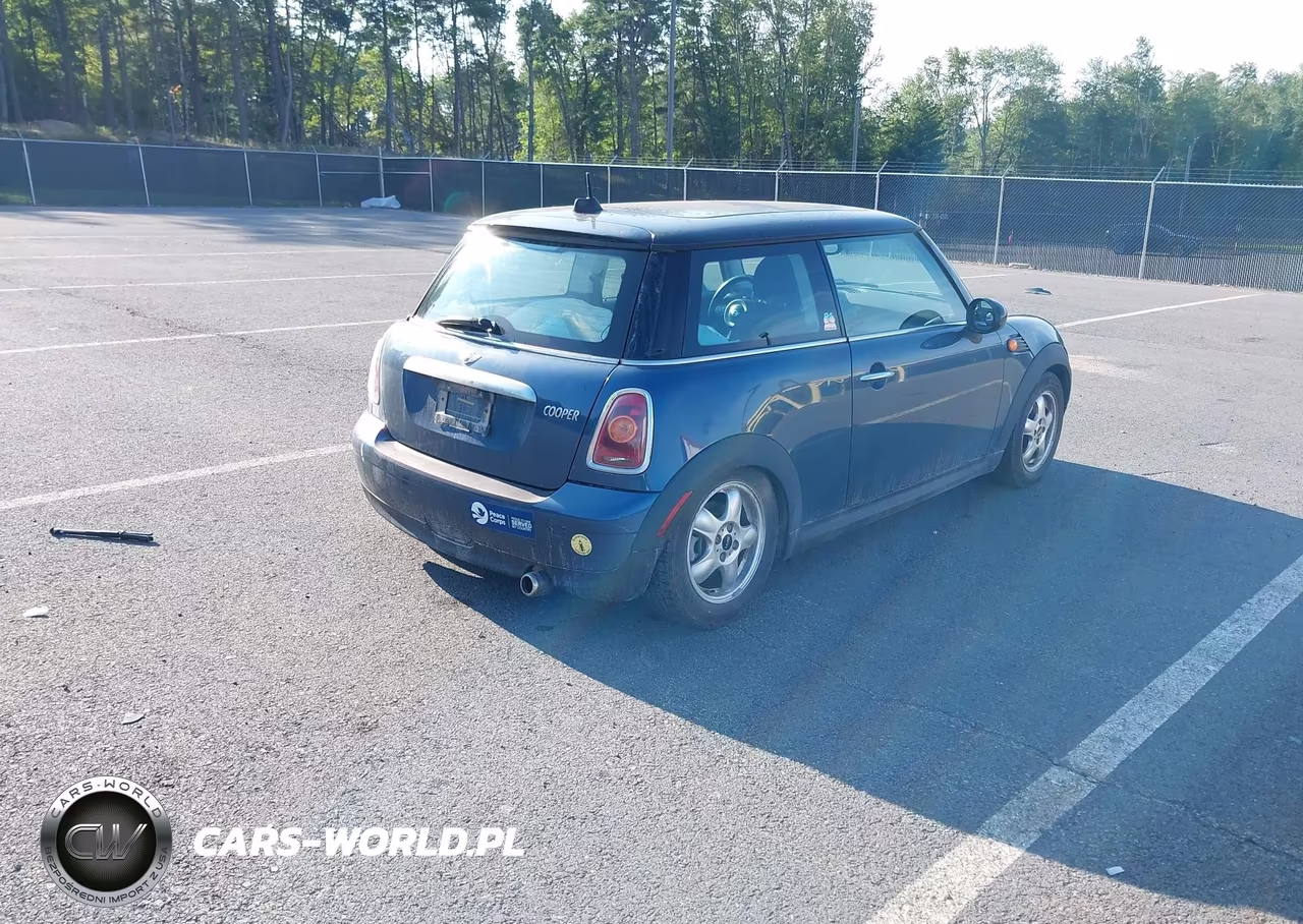 2009 Mini Cooper VIN:WMWMF33549TU75572 - 4