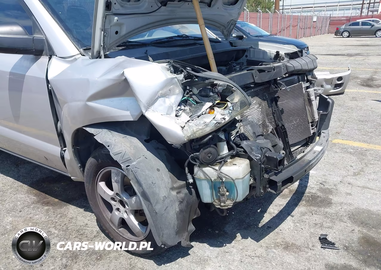 2005 Hyundai Tucson Gl VIN:KM8JM12B75U144699 - 13