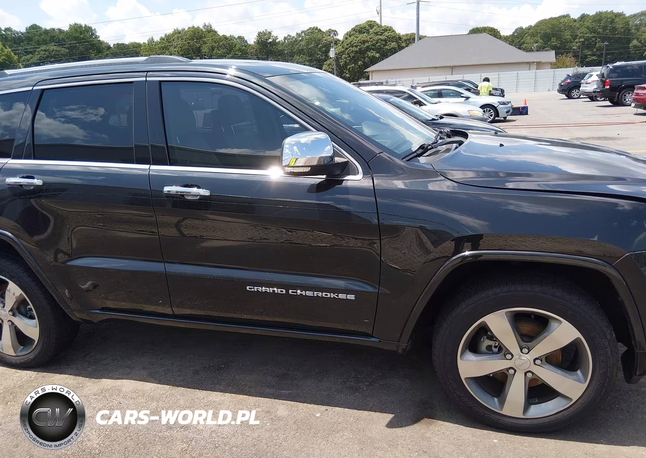2015 Jeep Grand Cherokee Overland VIN:1C4RJECM1FC860559 - 13