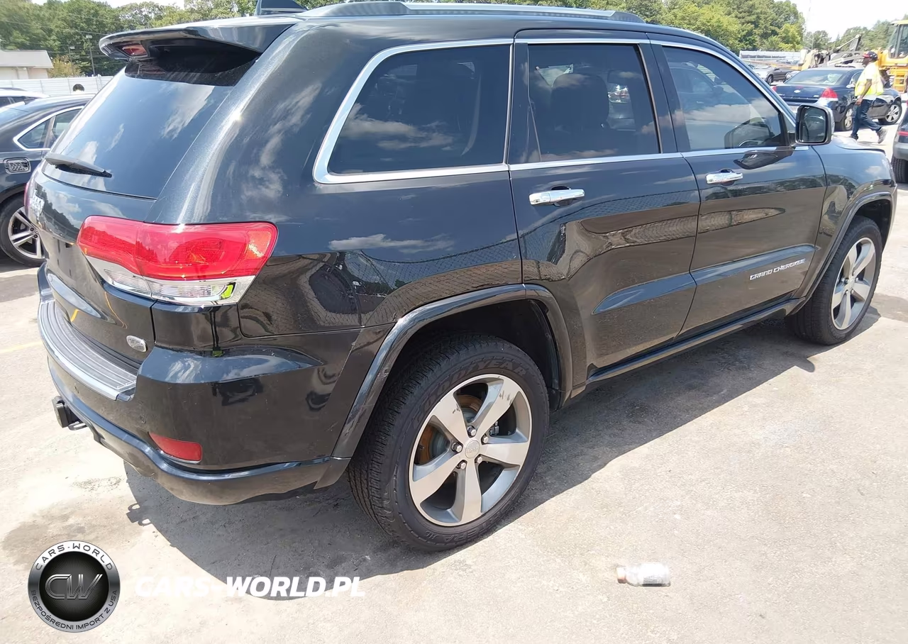 2015 Jeep Grand Cherokee Overland VIN:1C4RJECM1FC860559 - 4