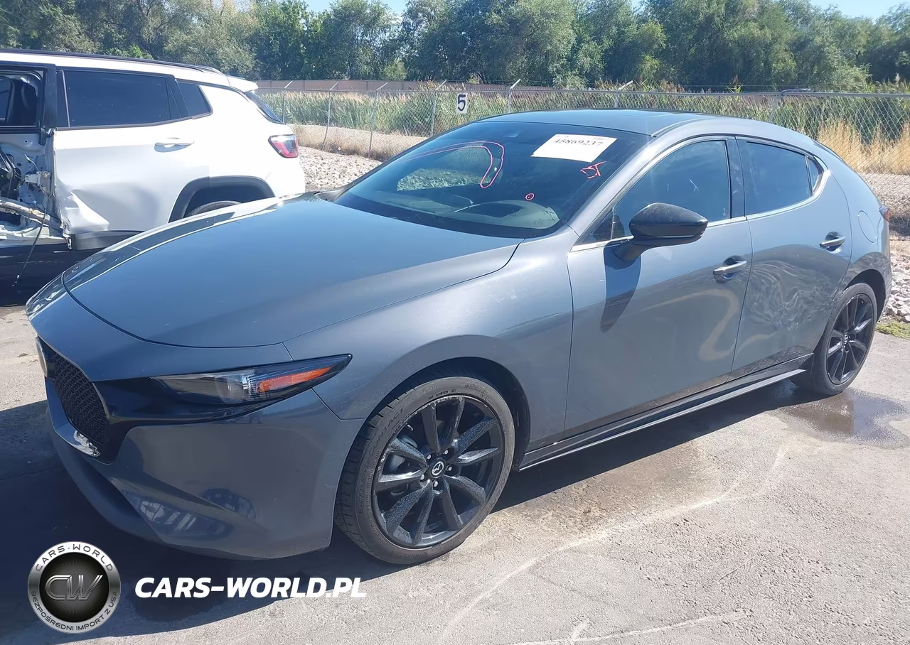 2021 Mazda Mazda3 Premium VIN:JM1BPAMLXM1304306 - 2