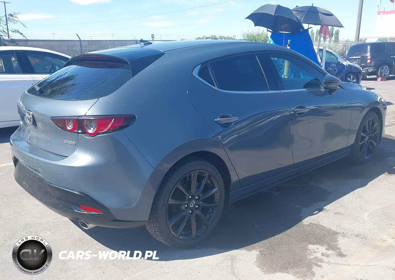 2021 Mazda Mazda3 Premium VIN:JM1BPAMLXM1304306 - 4