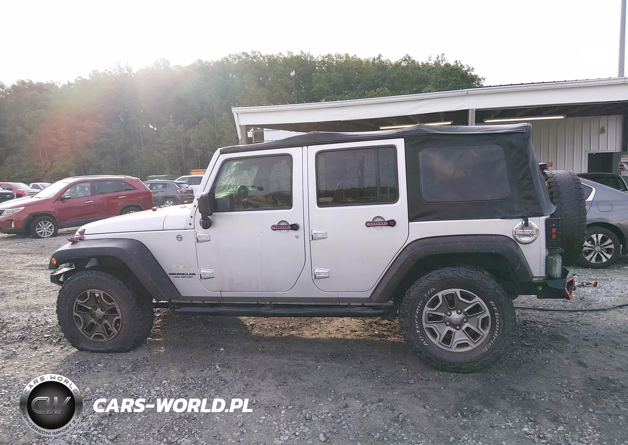 2012 Jeep Wrangler Unlimited Sahara VIN:1C4BJWEG4CL103942 - 14