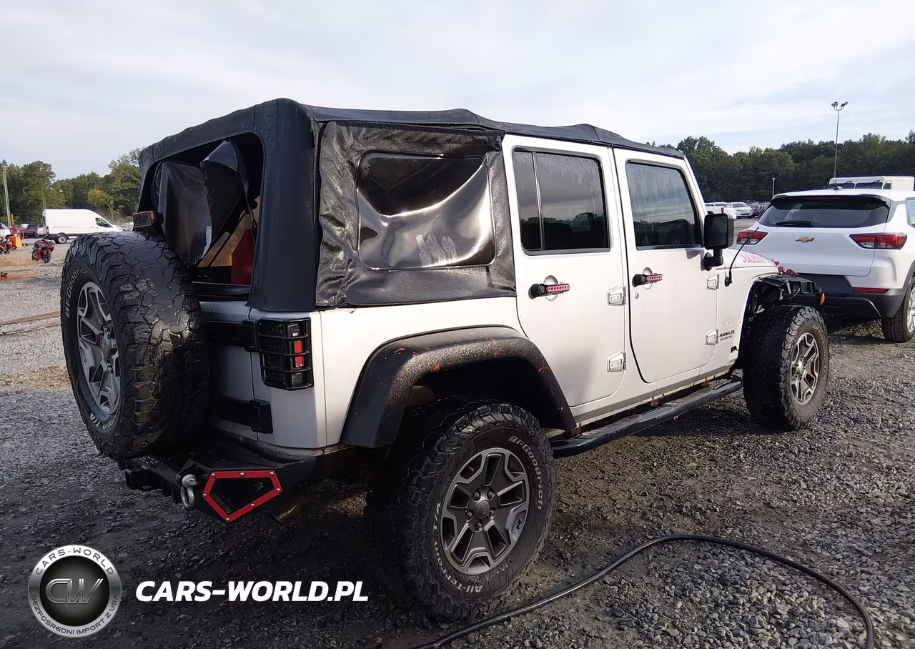 2012 Jeep Wrangler Unlimited Sahara VIN:1C4BJWEG4CL103942 - 4