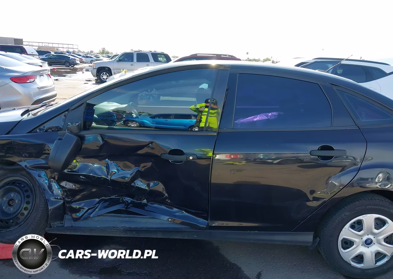 2013 Ford Focus S VIN:1FADP3E2XDL313771 - 14