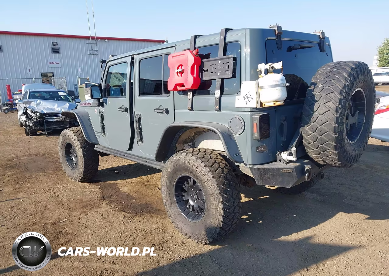 2014 Jeep Wrangler Unlimited Rubicon VIN:1C4BJWFG0EL119167 - 3