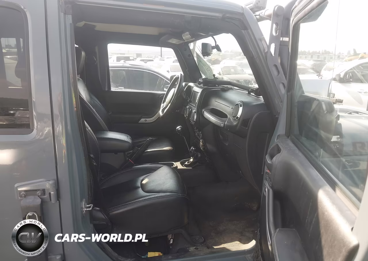 2014 Jeep Wrangler Unlimited Rubicon VIN:1C4BJWFG0EL119167 - 5