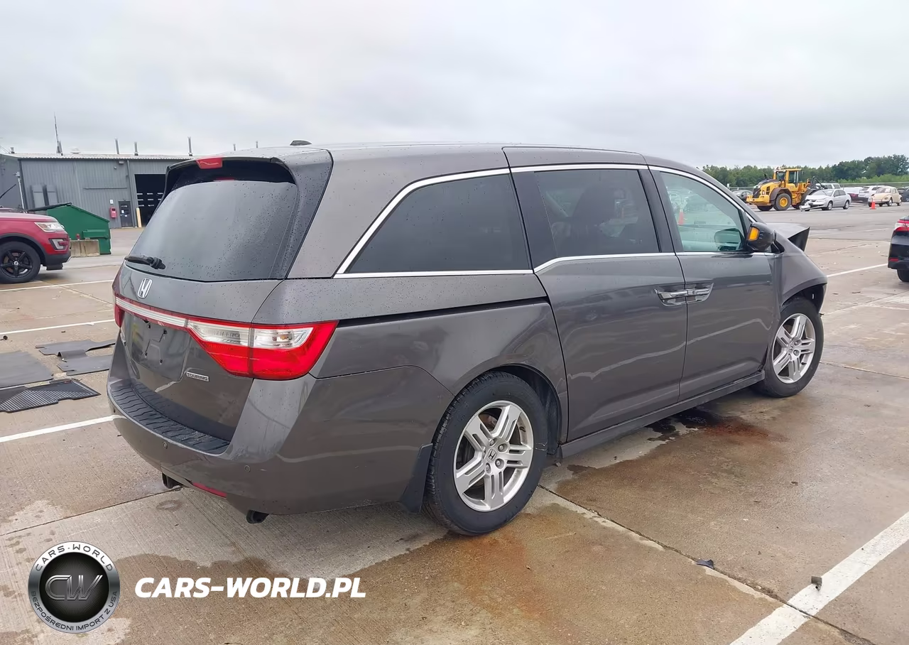 2011 Honda Odyssey Touring-Touring Elite VIN:5FNRL5H99BB104585 - 4