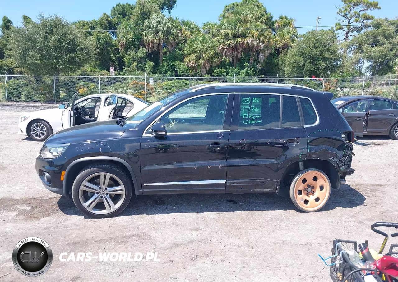 2014 Volkswagen Tiguan R-Line VIN:WVGAV3AX8EW560609 - 14