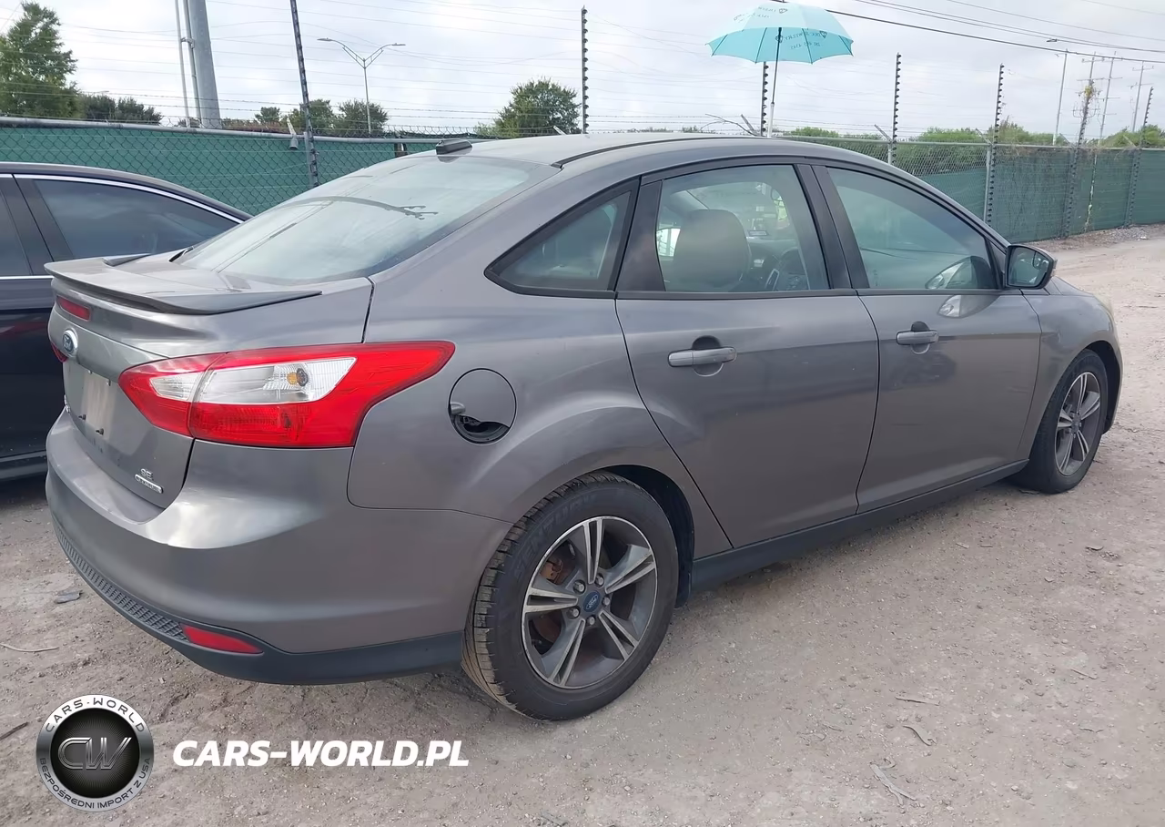 2014 Ford Focus Se VIN:1FADP3F27EL130277 - 4