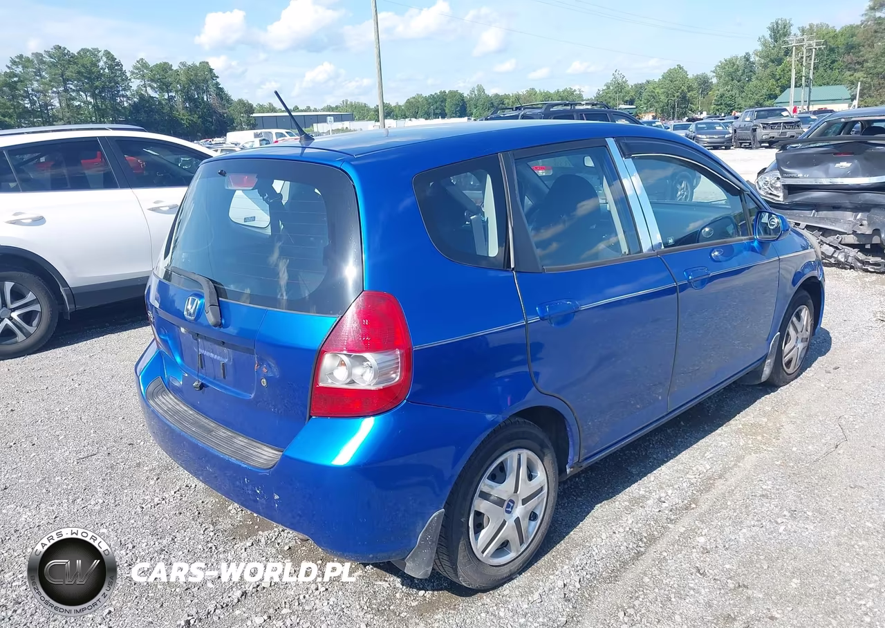 2007 Honda Fit VIN:JHMGD38407S017423 - 4