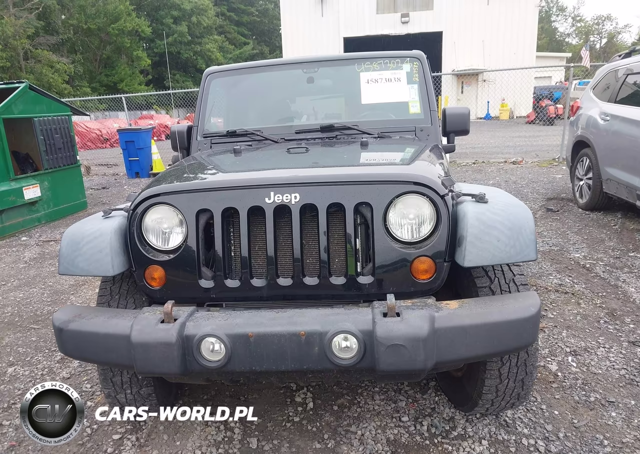 2011 Jeep Wrangler Rubicon VIN:1J4BA6D17BL527038 - 12