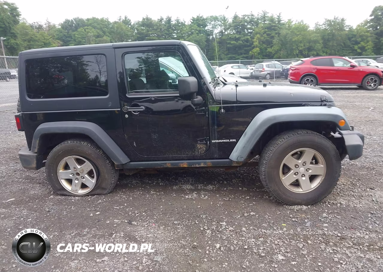 2011 Jeep Wrangler Rubicon VIN:1J4BA6D17BL527038 - 13