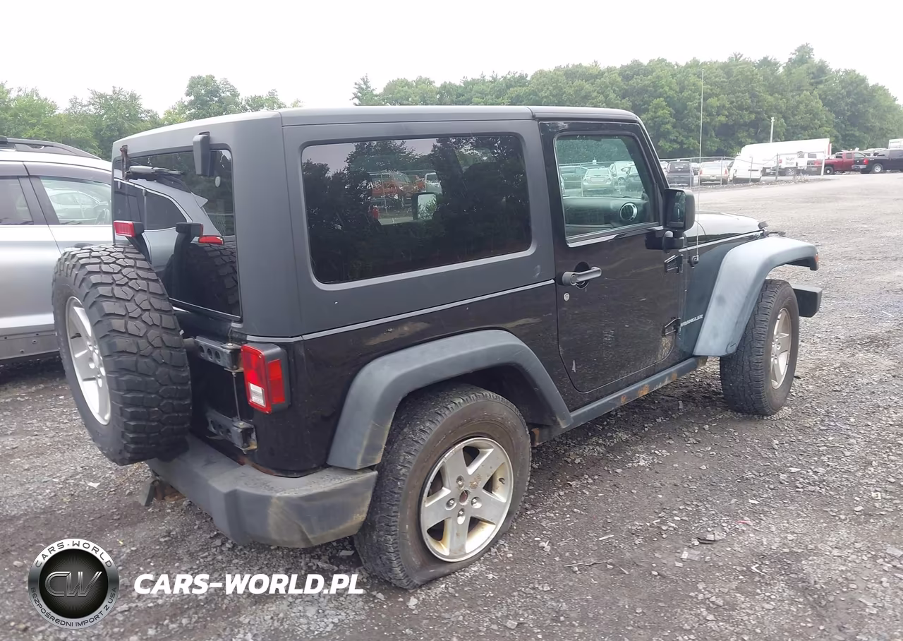 2011 Jeep Wrangler Rubicon VIN:1J4BA6D17BL527038 - 4