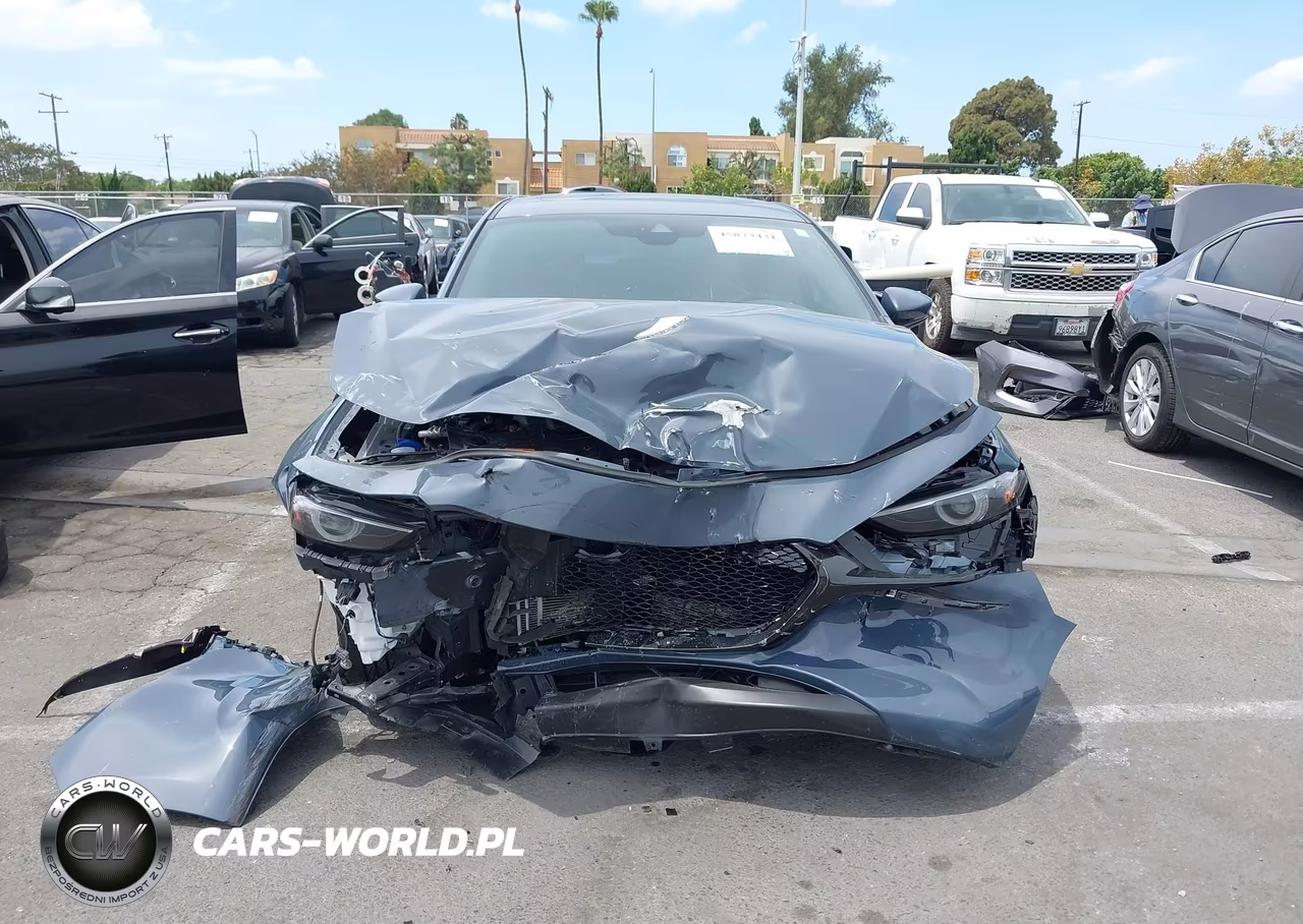 2021 Mazda Mazda3 Premium VIN:JM1BPAML3M1401850 - 12