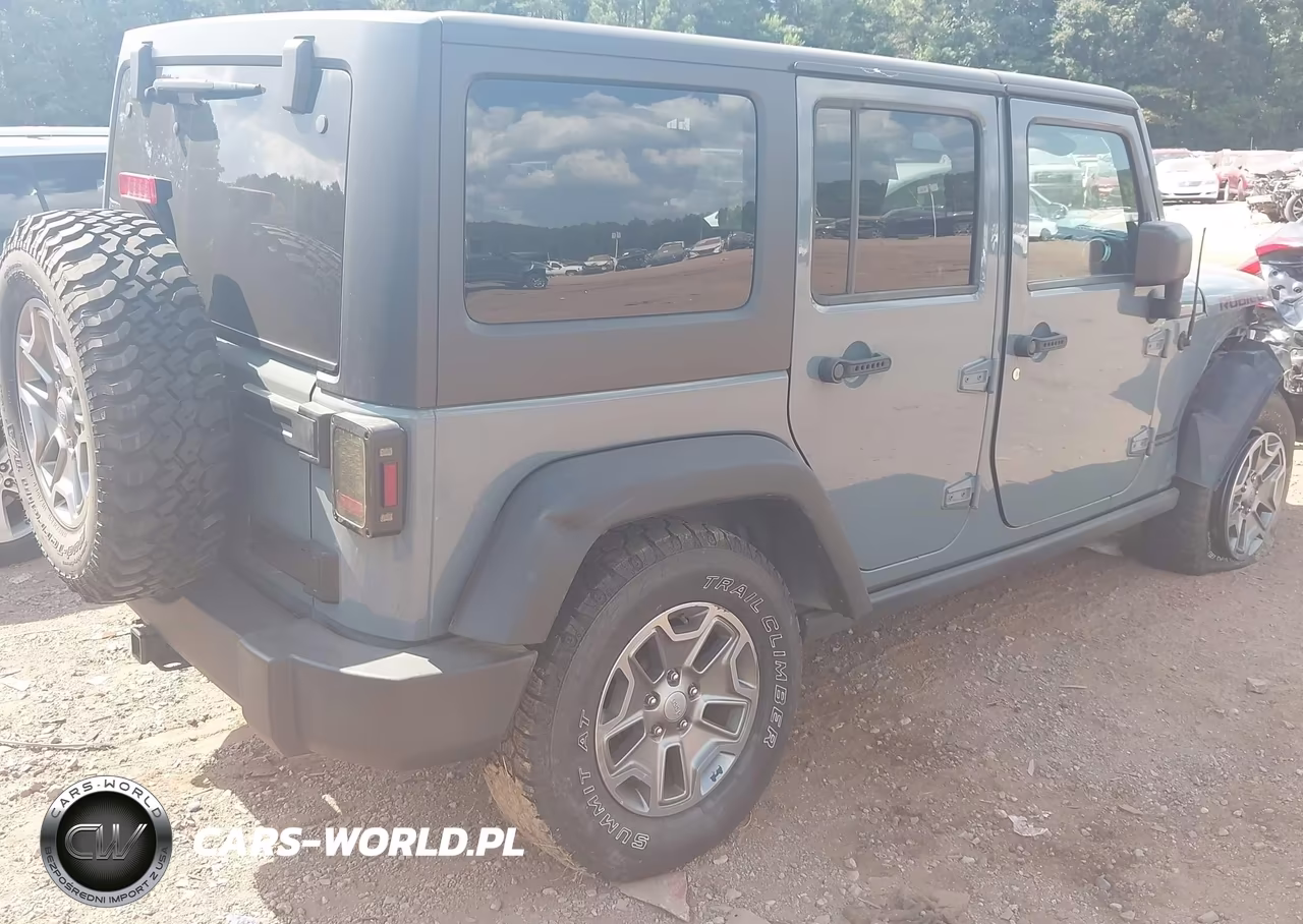 2015 Jeep Wrangler Unlimited Rubicon VIN:1C4HJWFG7FL697455 - 4