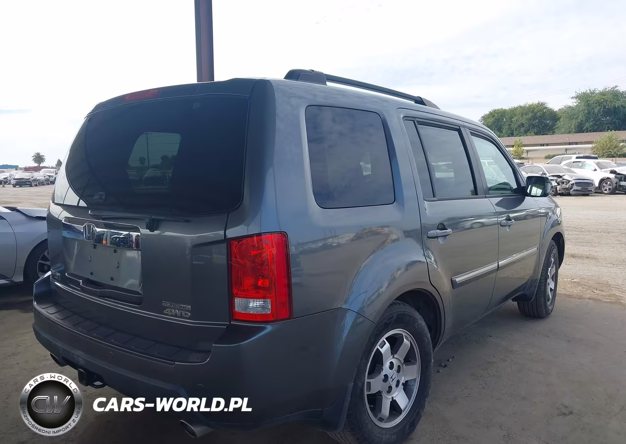 2011 Honda Pilot Touring VIN:5FNYF4H99BB001907 - 4