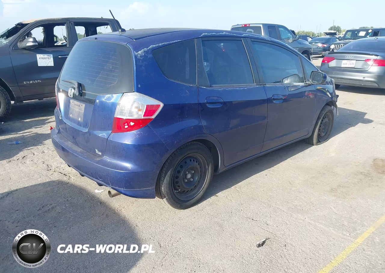 2012 Honda Fit VIN:JHMGE8G3XCC004329 - 4