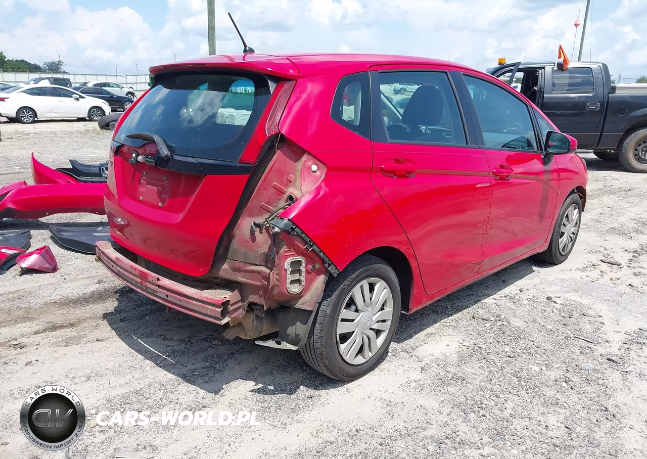 2015 Honda Fit Lx VIN:3HGGK5H59FM715968 - 4