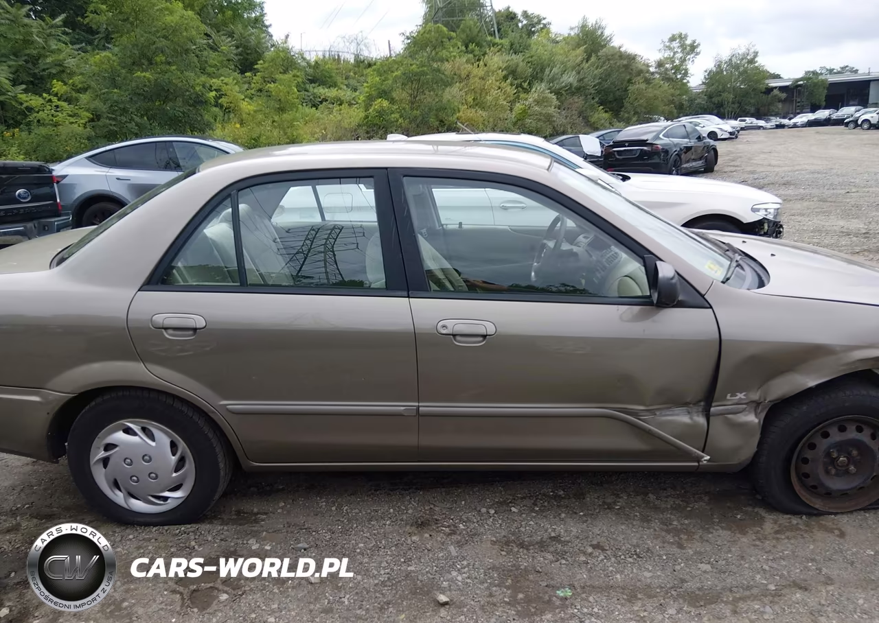 2000 Mazda Protege Dx-Lx VIN:JM1BJ2227Y0270046 - 13