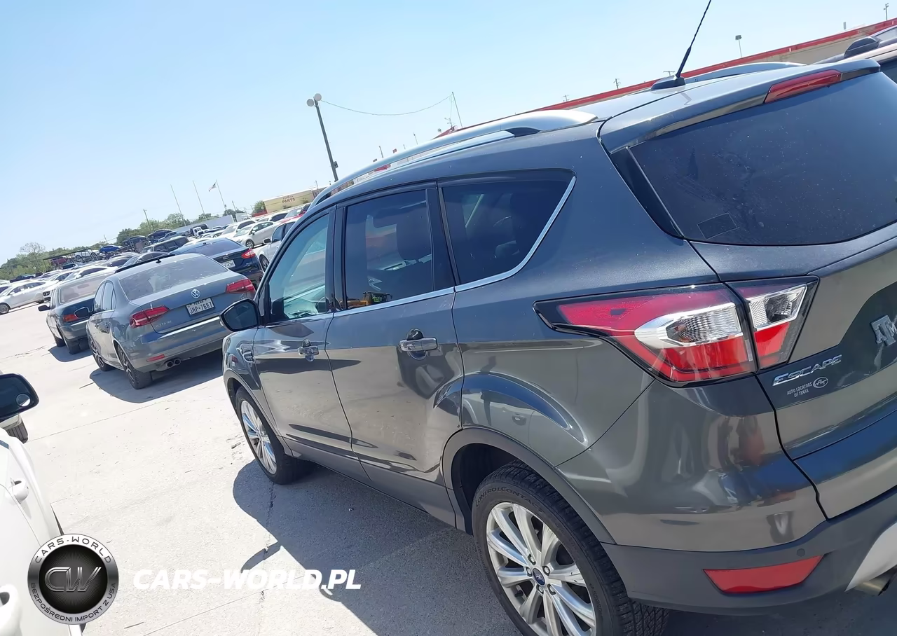 2017 Ford Escape Titanium VIN:1FMCU0JD2HUC12840 - 14