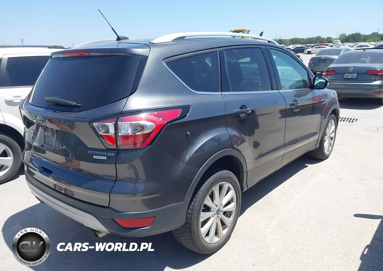 2017 Ford Escape Titanium VIN:1FMCU0JD2HUC12840 - 4