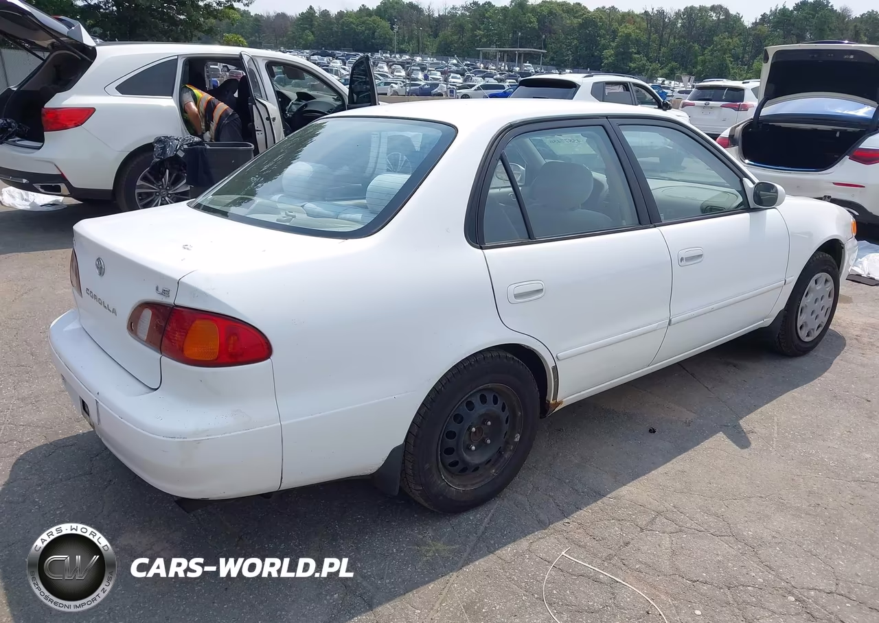 2000 Toyota Corolla Le VIN:1NXBR12E7YZ392441 - 4