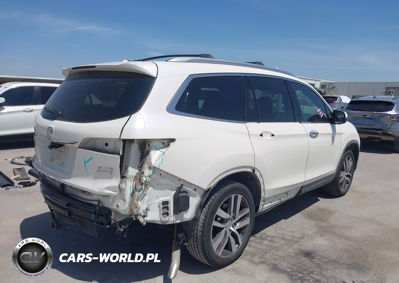 2018 Honda Pilot Elite VIN:5FNYF6H05JB046192 - 4