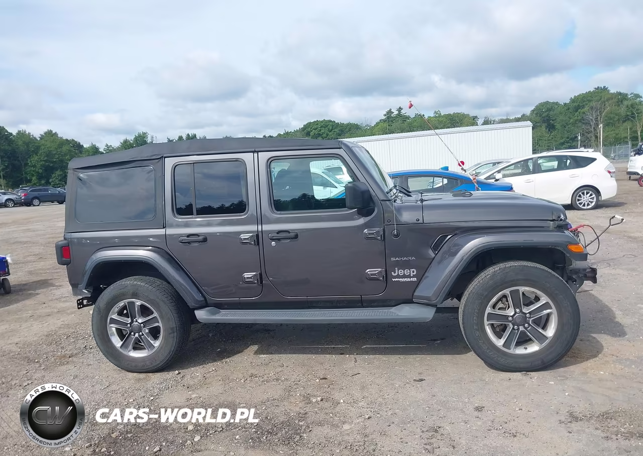 2019 Jeep Wrangler Unlimited Sahara 4X4 VIN:1C4HJXEG4KW576012 - 14