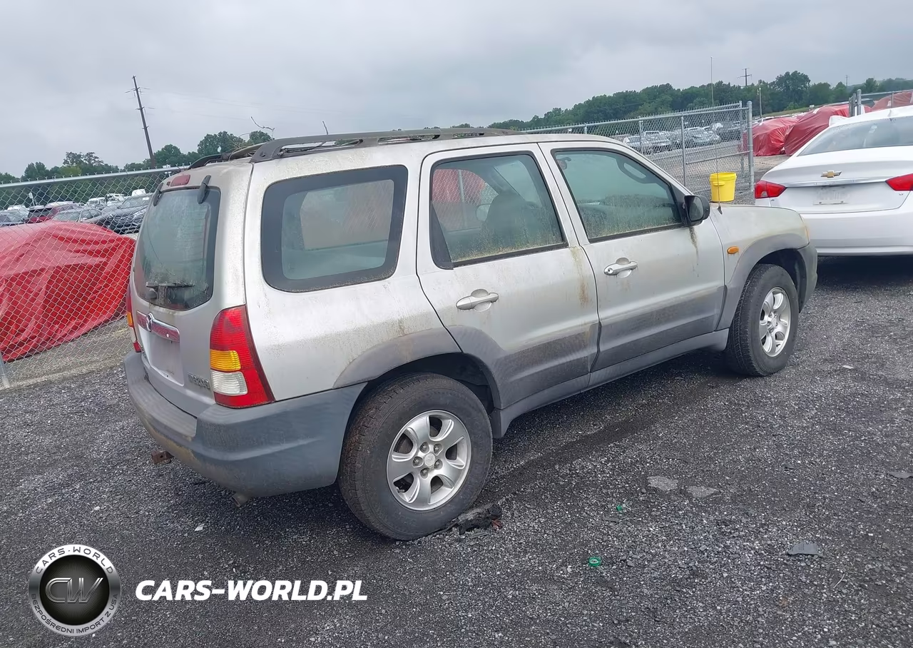 2001 Mazda Tribute VIN:4F2YU06131KM04598 - 4